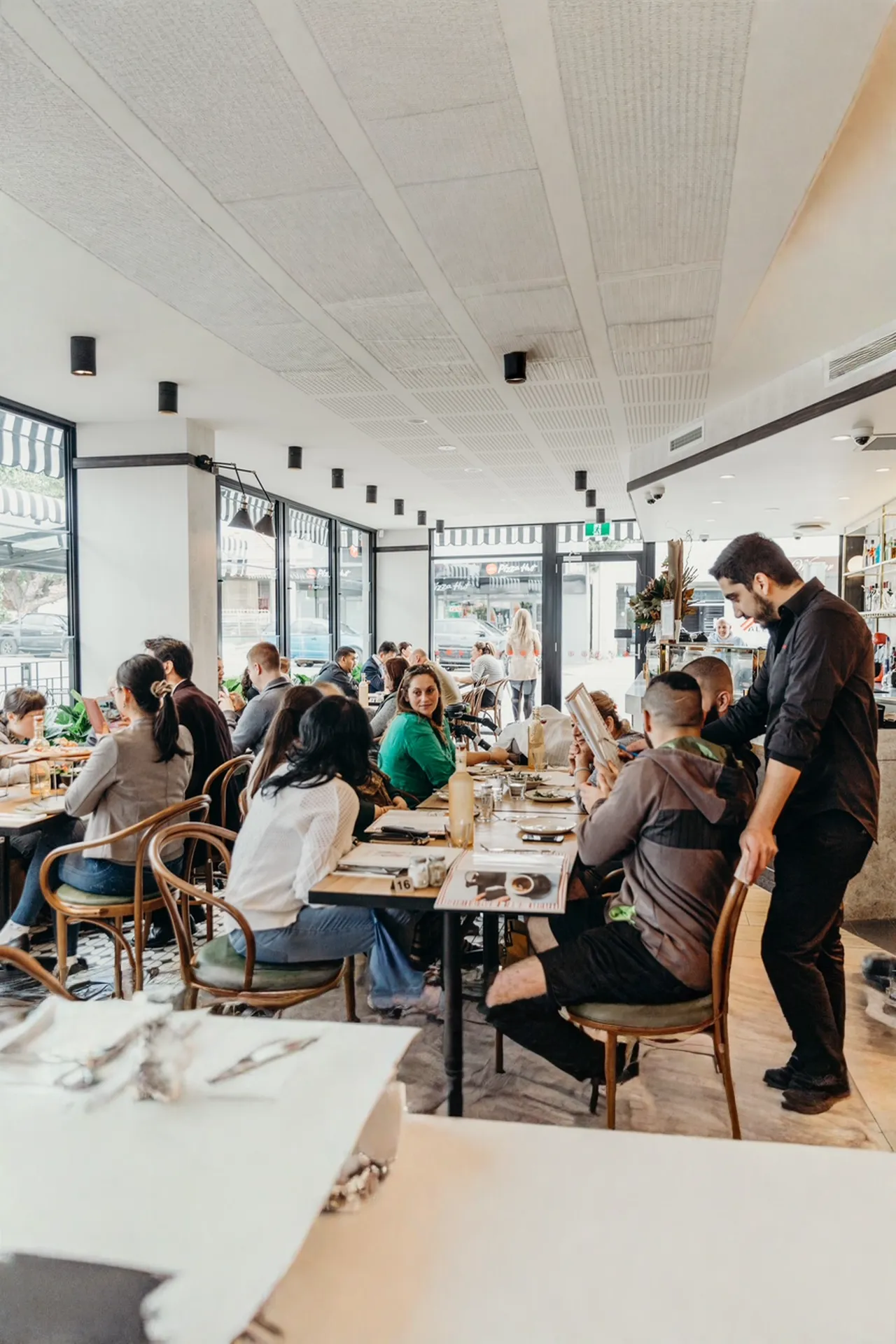 people at restaurant ordering people at restaurant ordering